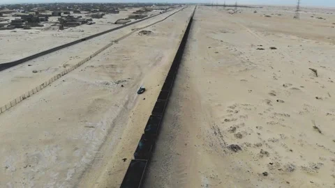 Train. Train in Mauritania. Train carrying coal. Industry in Mauritania. Film Stock Footage 137493092