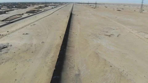 Train. Train in Mauritania. Train carrying coal. Industry in Mauritania. Film Stock Footage 137493132