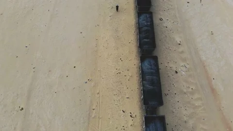 Train. Train in Mauritania. Train carrying coal. Industry in Mauritania. Film Stock Footage 137493146