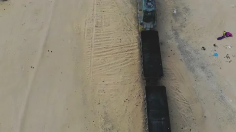 Train. Train in Mauritania. Train carrying coal. Industry in Mauritania. Film Stock Footage 137493191