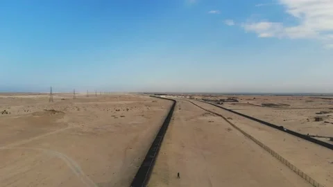 Train. Train in Mauritania. Train carrying coal. Industry in Mauritania. Film Stock Footage 137493268
