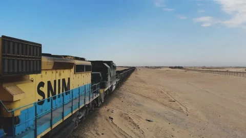 Train. Train in Mauritania. Train carrying coal. Industry in Mauritania. Film Stock Footage 137493343