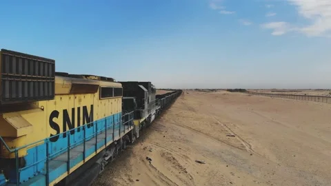 Train. Train in Mauritania. Train carrying coal. Industry in Mauritania. Film Stock Footage 137493358