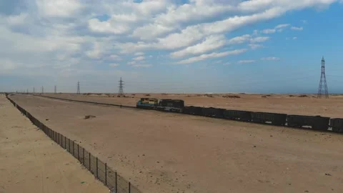 Train. Train in Mauritania. Train carrying coal. Industry in Mauritania. Film Stock Footage 137493447
