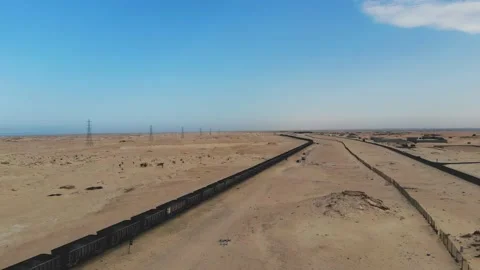 Train. Train in Mauritania. Train carrying coal. Industry in Mauritania. Film Stock Footage 137493667