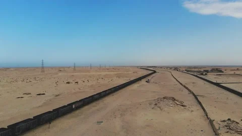 Train. Train in Mauritania. Train carrying coal. Industry in Mauritania. Film Stock Footage 137493681
