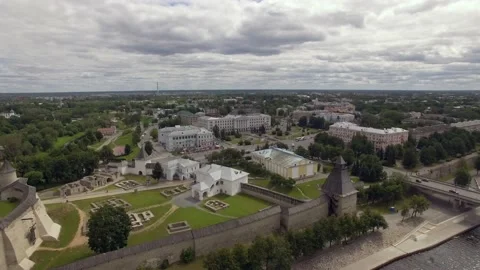 A train on a train track with buildings in the background Stock Footage 131958492