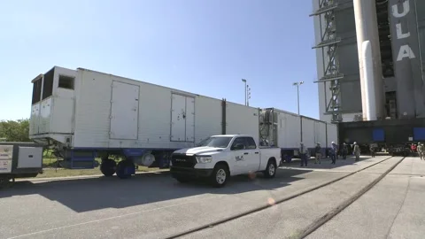 Train transporting Boeing's Starliner spacecraft atop of ULA Atlas V rocket Stock Footage 278514747