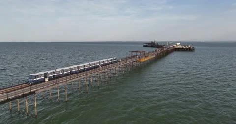 Train transporting passengers on Southend Pier Railway Video stock 202216917