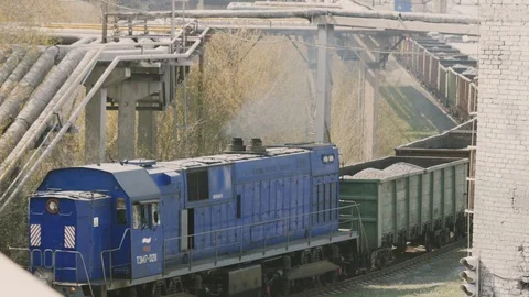 The train transports empty slag bowls to the blast furnace shop Stock Footage 106925768