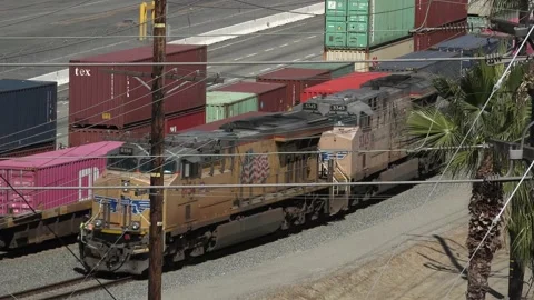 Train transshipping cargo at container port  Video stock 211805261