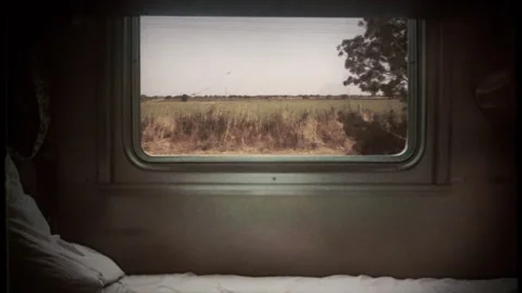 Train Travel Retro 16mm Empty Car bed Window View Countryside Old Film Texture Video stock 256985866