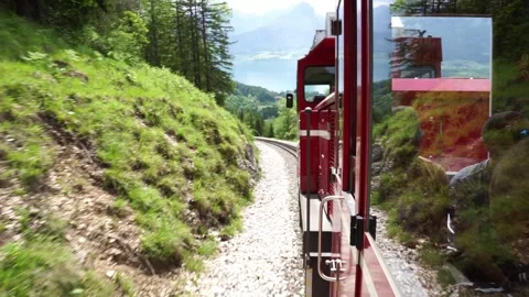 Train that travels through the mountains Video stock 243340128