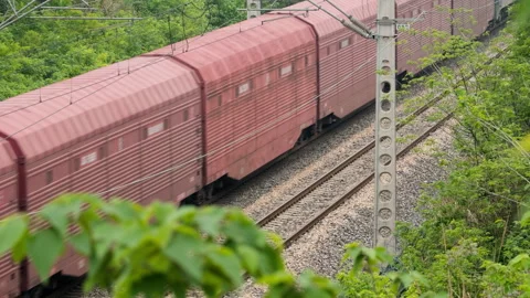The train travels on the tracks Stock Footage 244303560