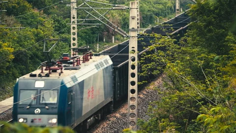 The train travels on the tracks Stock Footage 244304182
