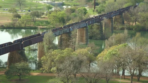 Train trestle bridge over austin town lake river in texas Video stock 73430498