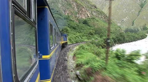 Train trip in Peru to Machu Picchu alongside the river Urubamba Stock Footage 48750495