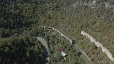 A train tunnel near a mountain Stock Footage 291702889