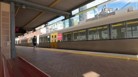 Train turning up at a Brisbane train station. Stock Footage 274242810