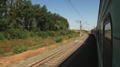 The train is turning, view of the forest Stock Footage 158012276