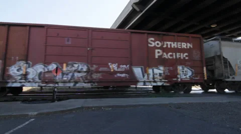 Train Under Bridge - Side Angle Stock Footage 34073189