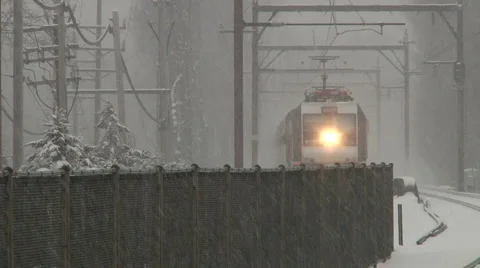 Train under snow storm arrives at train station-Liberta0041 Stock Footage 1053751