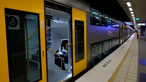 Train at underground station with guard slo-mo Stock Footage 108678281