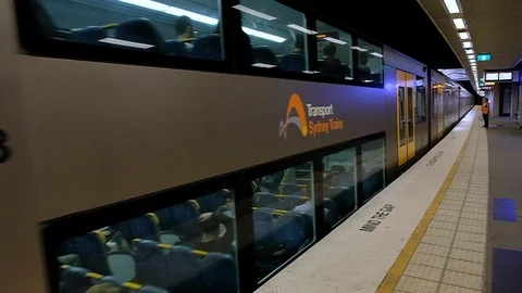 Train at underground station with guard slo-mo Stock Footage 108679624