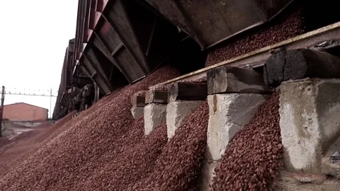 The train unloads rubble. Unloading of crushed stone at the plant. Stock Footage 196087522