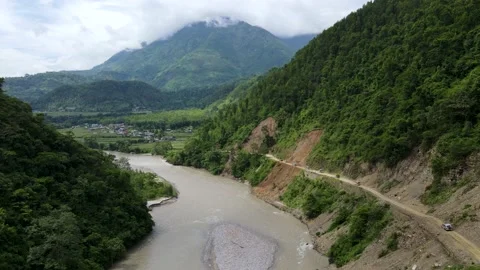 Train of vehicles, Vehicles running on the mountain road in Nepal Stock Footage 156964932