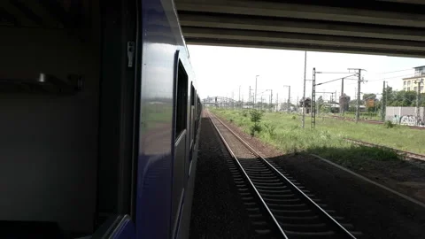 Train View Out Window and Under Bridge 스톡 동영상 154007174