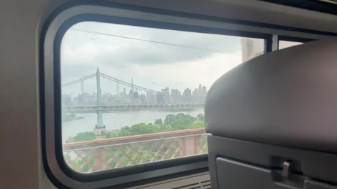 Train View of Robert F. Kennedy Bridge and NYC Skyline Stock Footage 339229977
