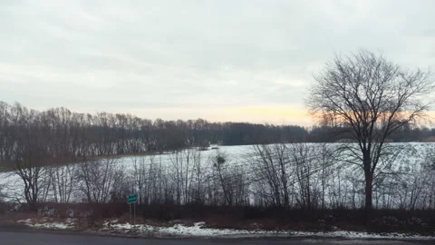 Train view through the window on the fields in winter in 4k slow motion Stock Footage 88841071