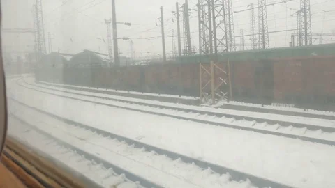 Train view from the window in winter city Stock Footage 83791251