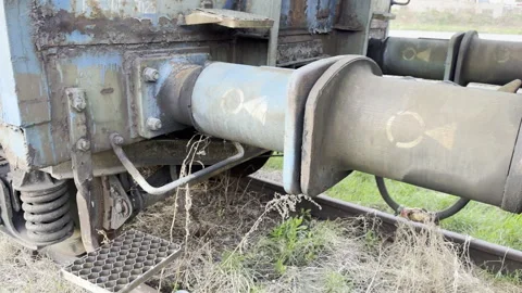 Train wagon buffers coupling mechanism close up Stockbeeldmateriaal 333655459