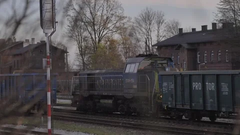 Train with wagons moving on railway tracks Stock Footage 244710596
