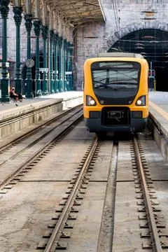 Train waiting at platform at train station in Lisbon Stock Photos