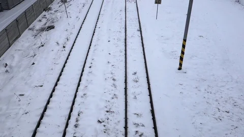 A train walking on a snowy rail Stock Footage 107780546