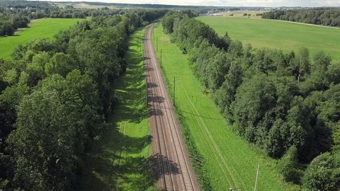 Train Way Through Green Grassed Countryside, Aerial. Stock-Footage 114077309