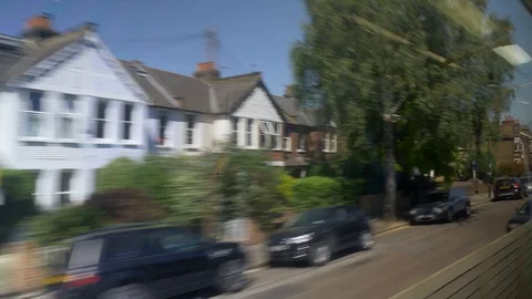 Train window angle view england town houses Stock Footage 92829006