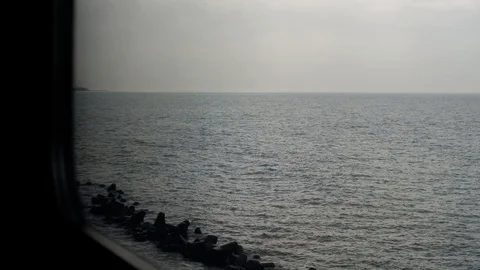 From the train window a beautiful view of the sea Stock Footage 128241811