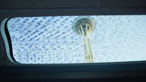 Train Window Frames Blurred View of Space Needle in Seattle 스톡 동영상 345157030
