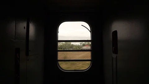 Train Window Glass. View from moving train side window Landscape Mountain Stock Footage 114006376