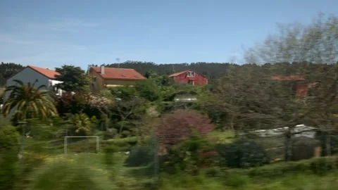 Train Window Journey: Speeding Through Spectacular Green Landscapes Stock Footage 246685039