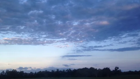 Train window scene of beautiful evening twilight scene in Australia Stock Footage 87939723