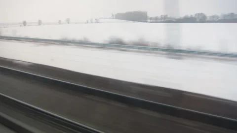 Train window snow view in motion Stock Footage 255932368