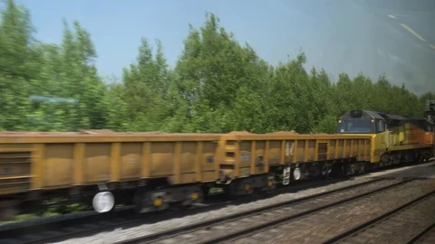 Train window view england next to another train Stock Footage 92829125