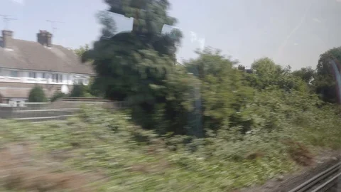 Train window view english town Stock Footage 92829183