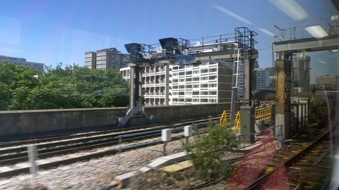 Train window view entering london station Stock Footage 92829216