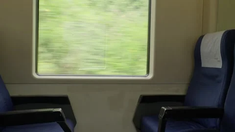 Train Window View with Facing Blue Seats in Asturias Stock Footage 340960915